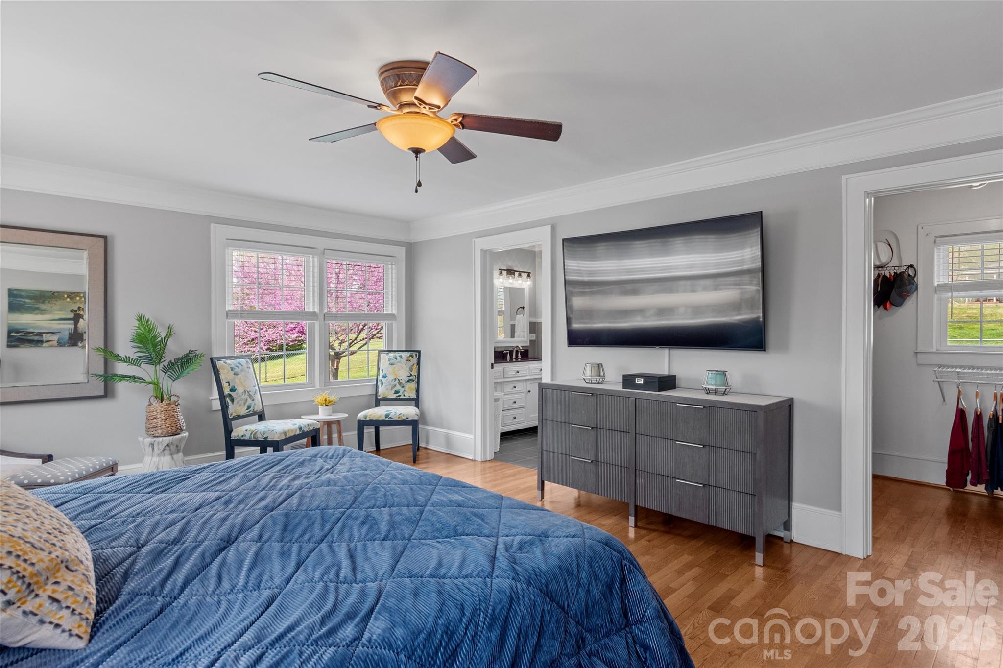 734 Oakland Drive Elkin, NC 28621 - Photo 22 of 48 a bedroom with a bed and a flat screen tv