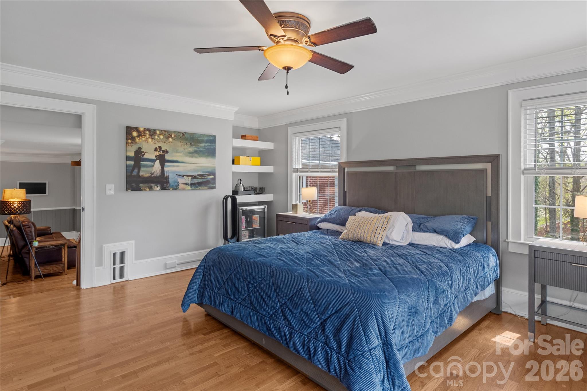 734 Oakland Drive Elkin, NC 28621 - Photo 23 of 48 a bedroom with a bed and wooden floor