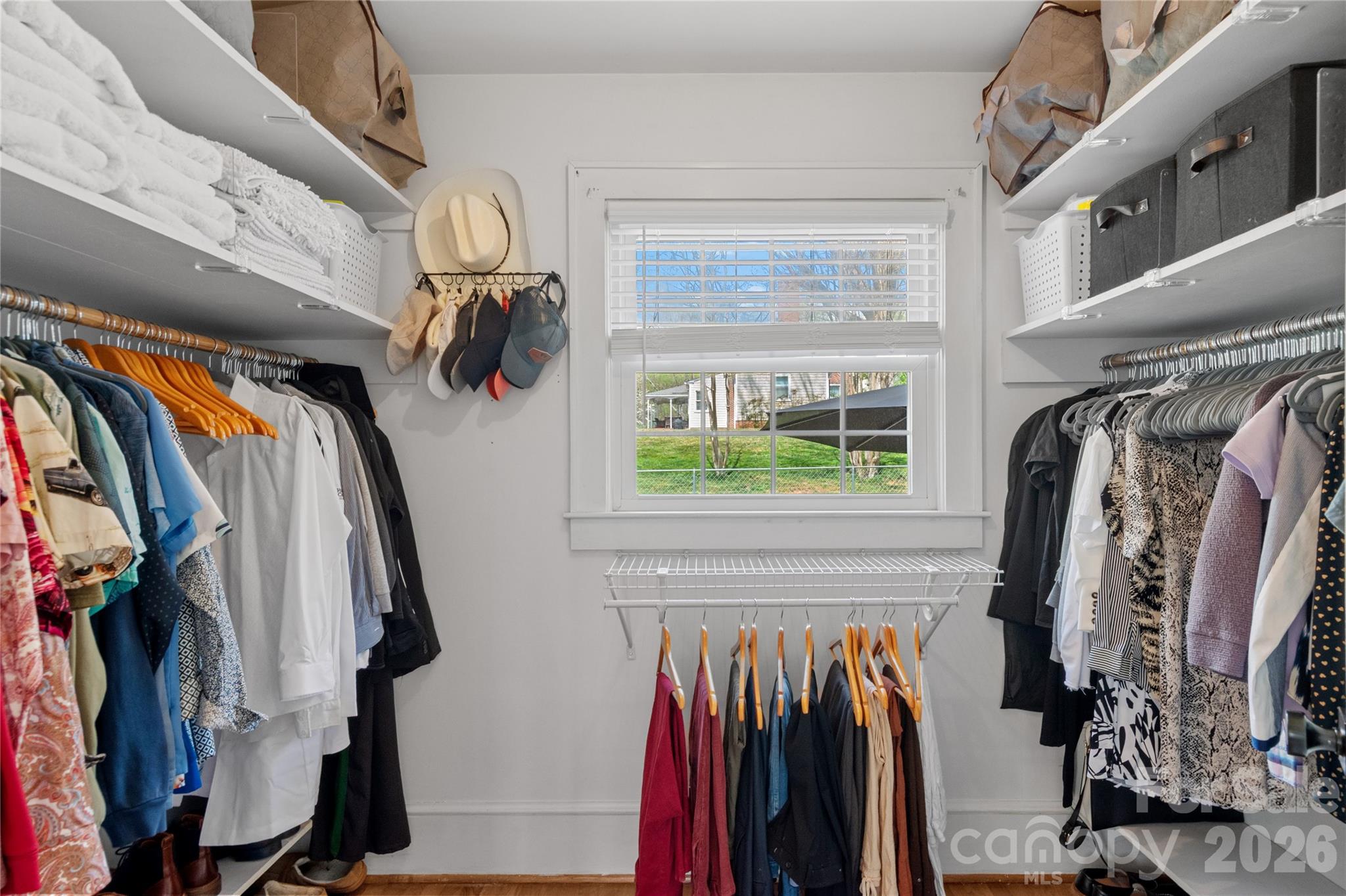 734 Oakland Drive Elkin, NC 28621 - Photo 26 of 48 a view of walk in closet with clothes and shoes