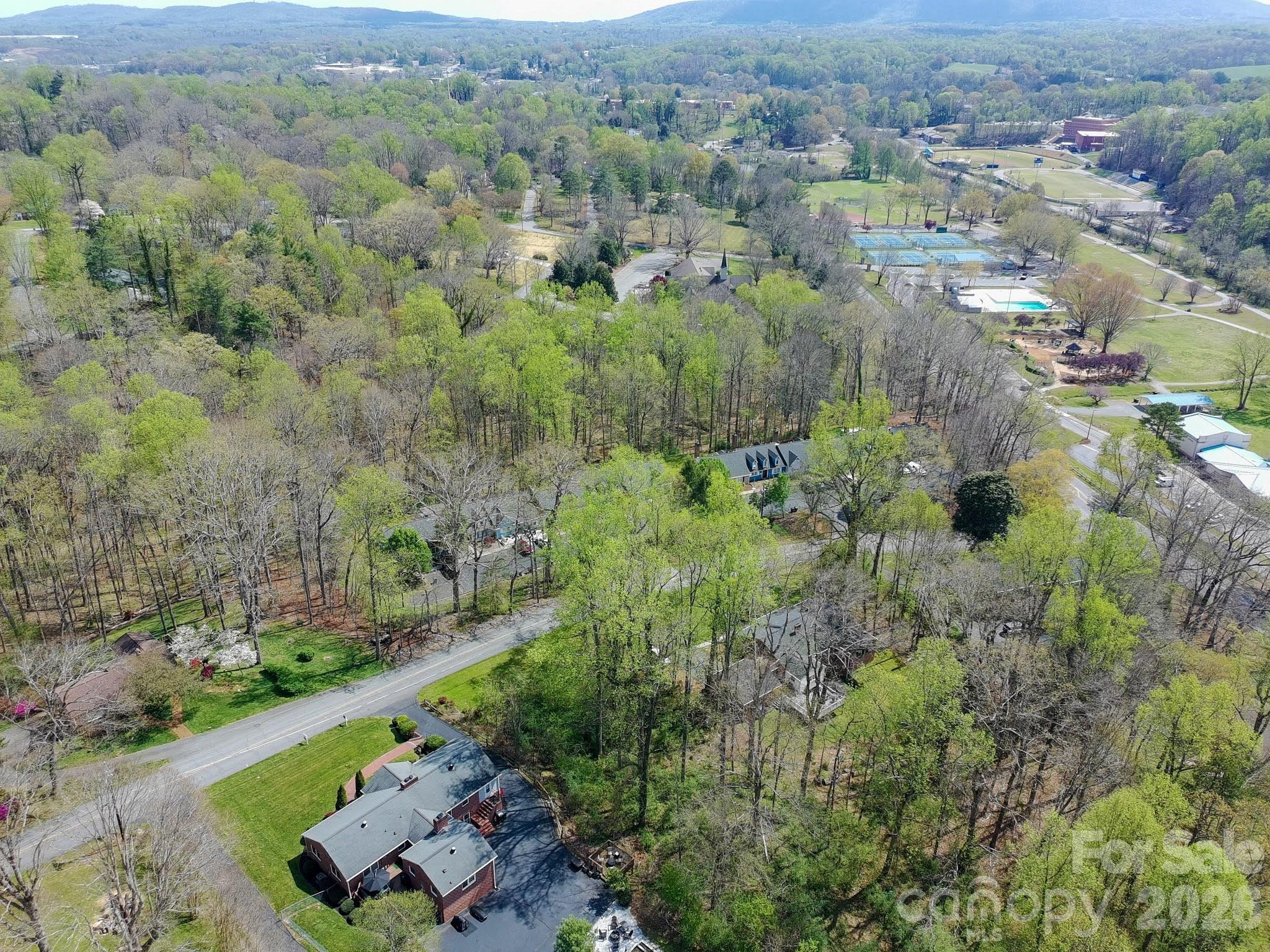 734 Oakland Drive Elkin, NC 28621 - Photo 43 of 48 an aerial view of a house with a yard