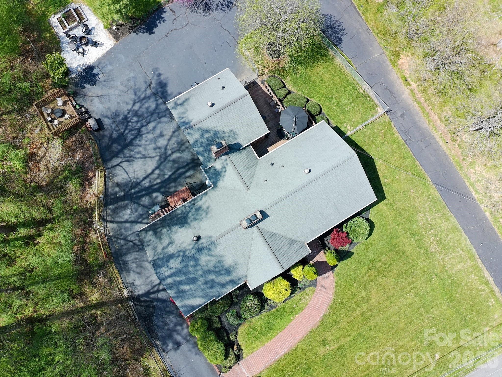 734 Oakland Drive Elkin, NC 28621 - Photo 48 of 48 an aerial view of a house with a yard and pool