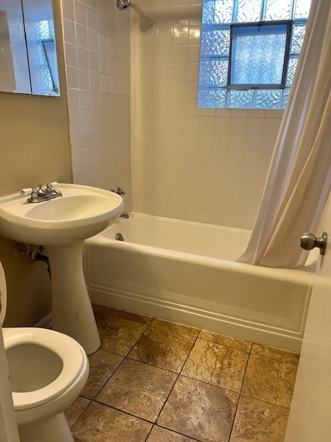 1116 Thomas Avenue, Unit G Forest Park, IL 60130 - Photo 5 of 9 a bathroom with a sink and a toilet