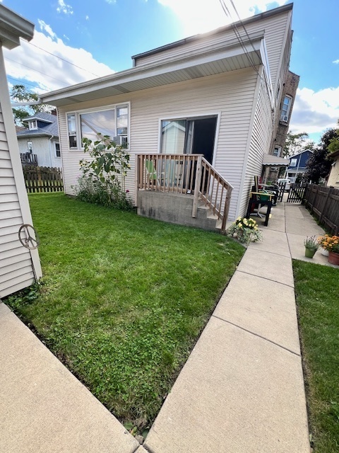 1116 Thomas Avenue, Unit G Forest Park, IL 60130 - Photo 9 of 9 a view of a porch with a garden