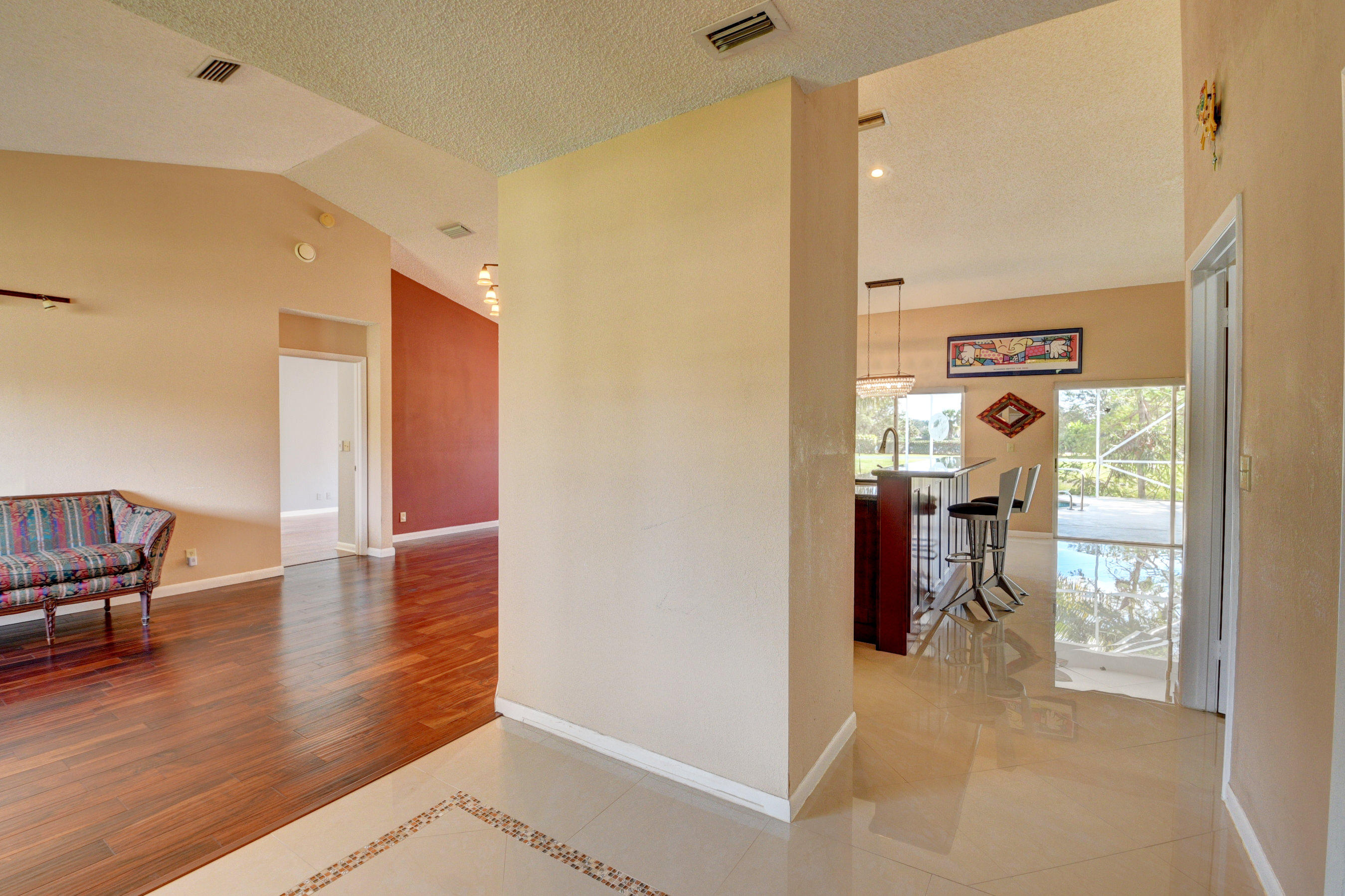 12059 Rockwell Way Boca Raton, FL 33428 - Photo 7 of 28 a view of a hallway view with living room