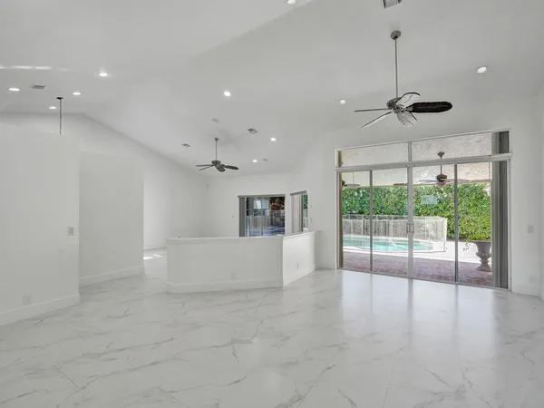 a view of a furniture and floor to ceiling window