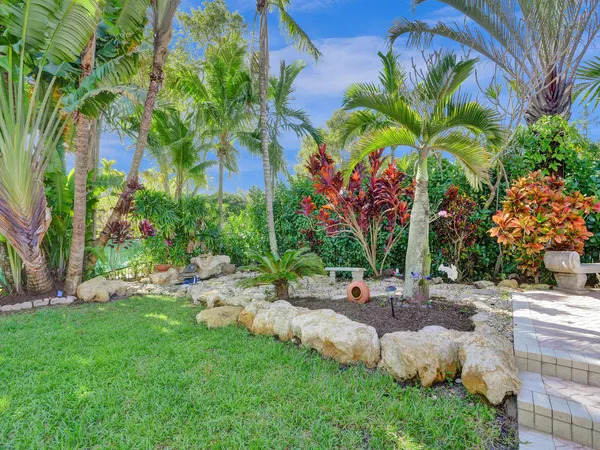 a view of a backyard with a garden