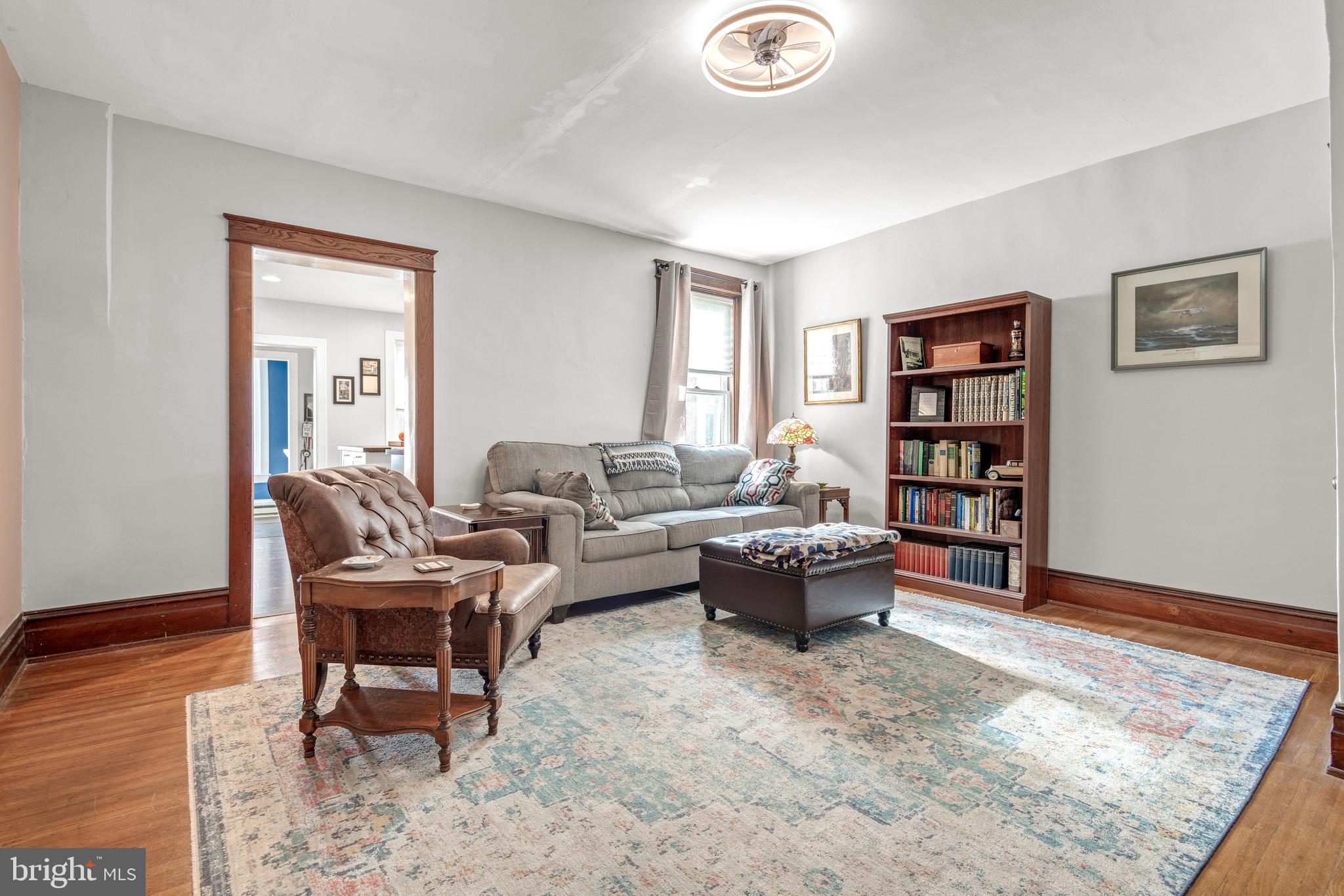 156 Front Street Lititz, PA 17543 - Photo 23 of 58 a living room with furniture and a wooden floor