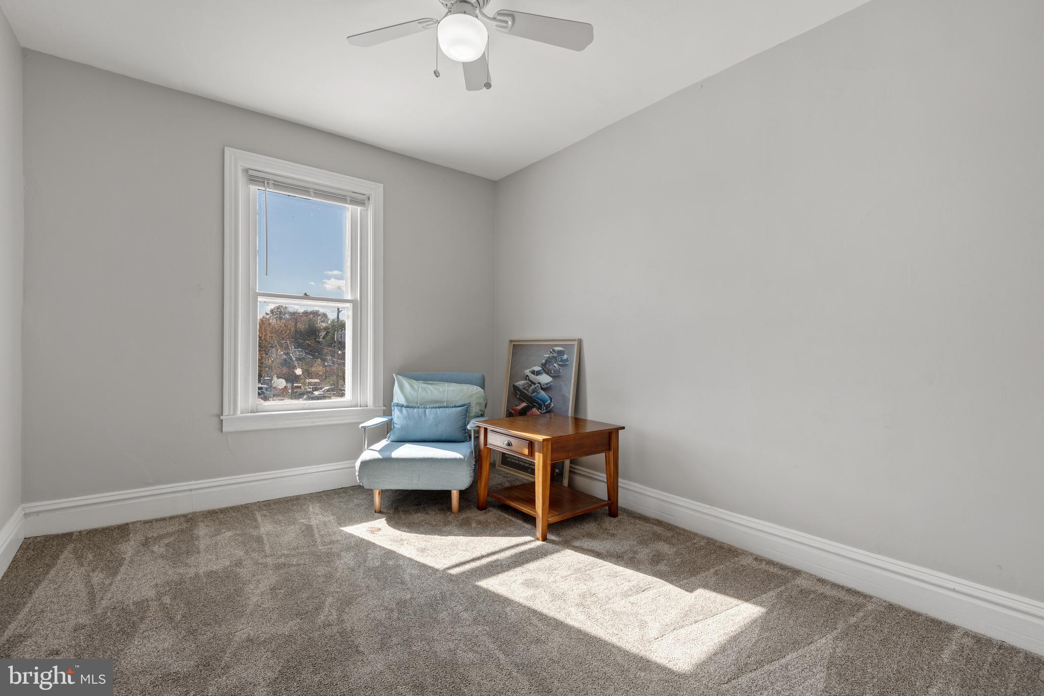 156 Front Street Lititz, PA 17543 - Photo 36 of 58 a living room with furniture and a window