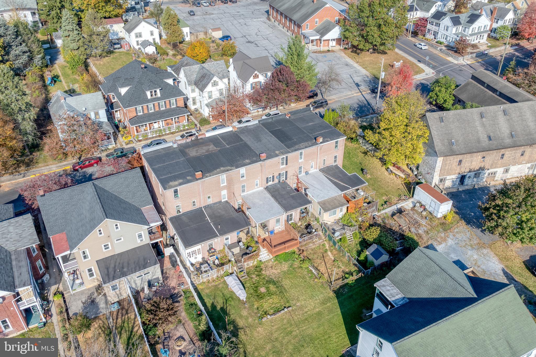 156 Front Street Lititz, PA 17543 - Photo 51 of 58 an aerial view of a house with a yard and sitting area