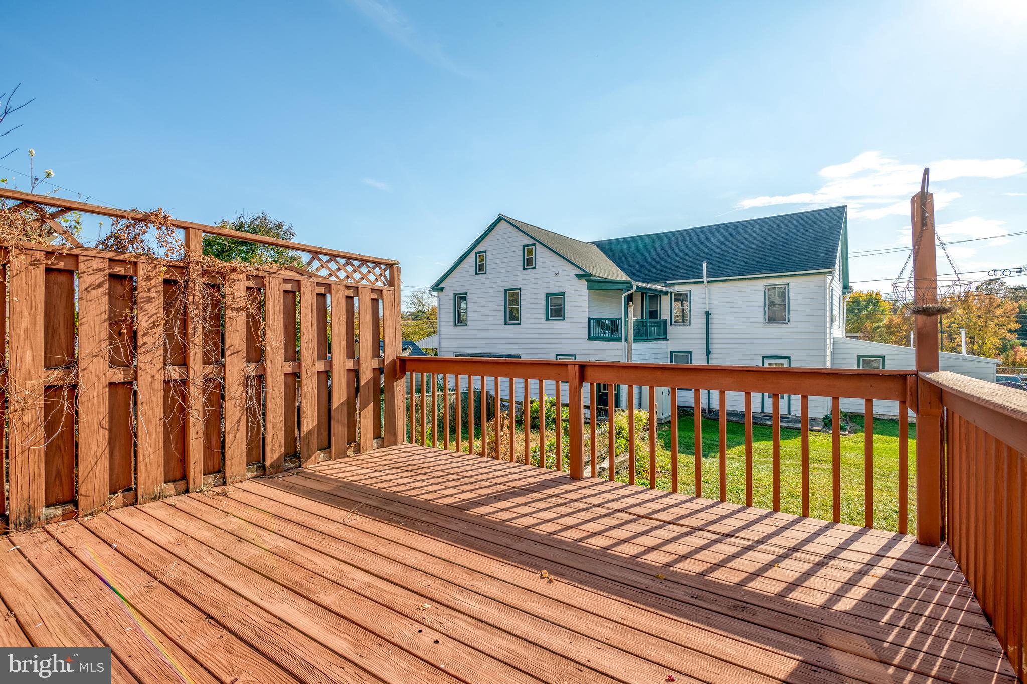 156 Front Street Lititz, PA 17543 - Photo 6 of 58 a balcony with wooden floor and fence