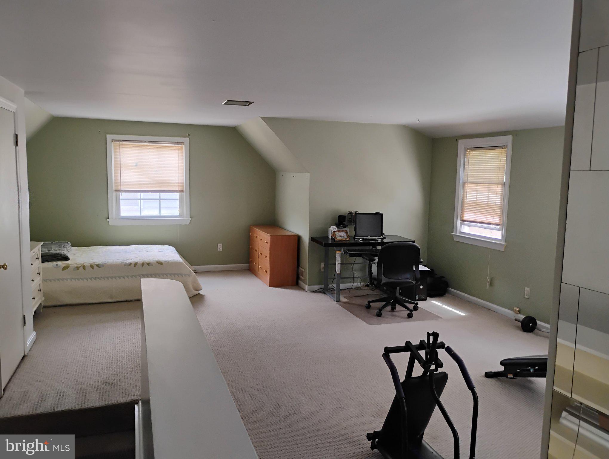 3908 Lantern Drive Silver Spring, MD 20902 - Photo 11 of 15 a bedroom with furniture and a window