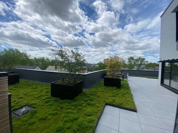 a view of a garden with patio