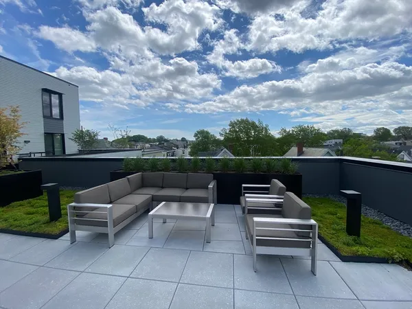 a view of a terrace with couches