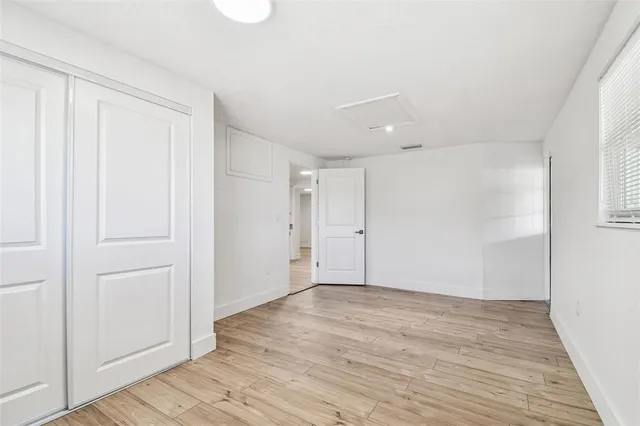 a bathroom with a shower and a bath tub