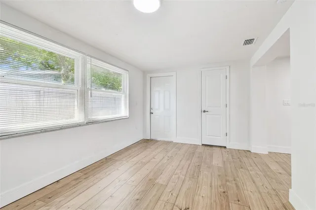 a house view with a backyard space