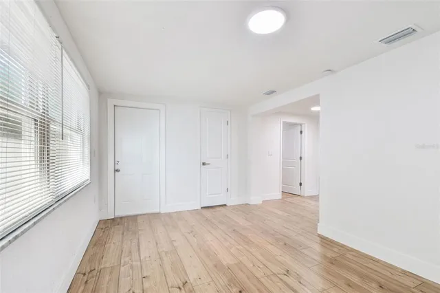 a house view with a garden space