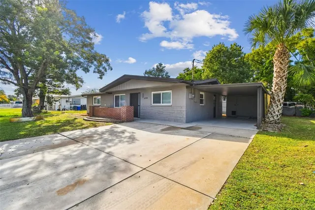 a view of kitchen view wooden floor and an oven