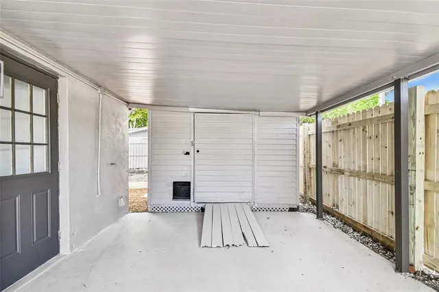 a view of a refrigerator in kitchen and wooden floor