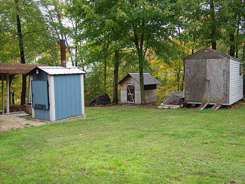 540 Orchard Road Enon Valley, PA 16120 - Photo 8 of 20 Exterior Back. Wood furnace and a chicken coop