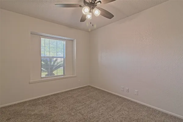 wooden floor and window in a room