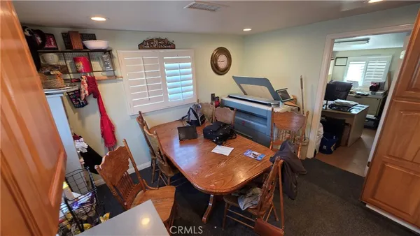a room with furniture and a flat screen tv
