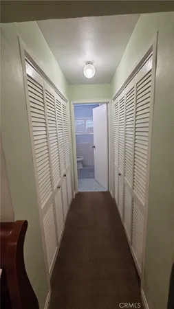 a bathroom with a toilet sink and shower