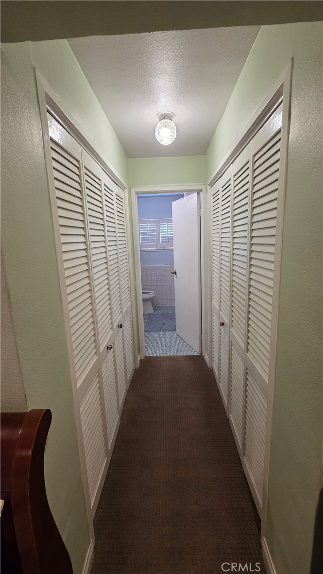 1642 Fourth Street Norco, CA 92860 - Photo 27 of 35 a view of hallway with stairs
