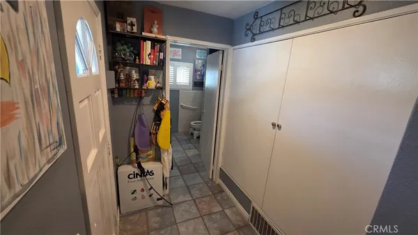 a room with storage and utility