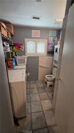 a bathroom with a sink a mirror and shower