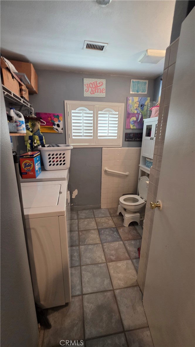 1642 Fourth Street Norco, CA 92860 - Photo 34 of 35 a room with storage and utility