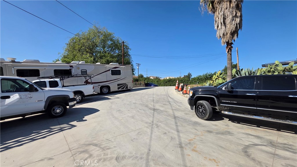 1642 Fourth Street Norco, CA 92860 - Photo 4 of 35 a view of a car parked in the road