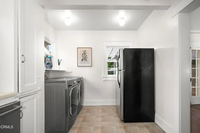 a view of a kitchen from the hallway