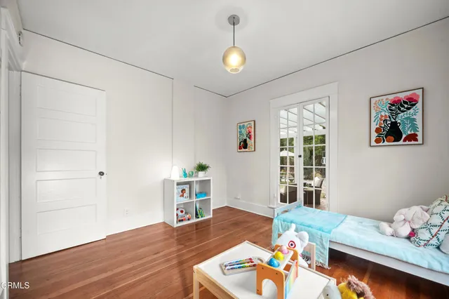 a living room with furniture and window