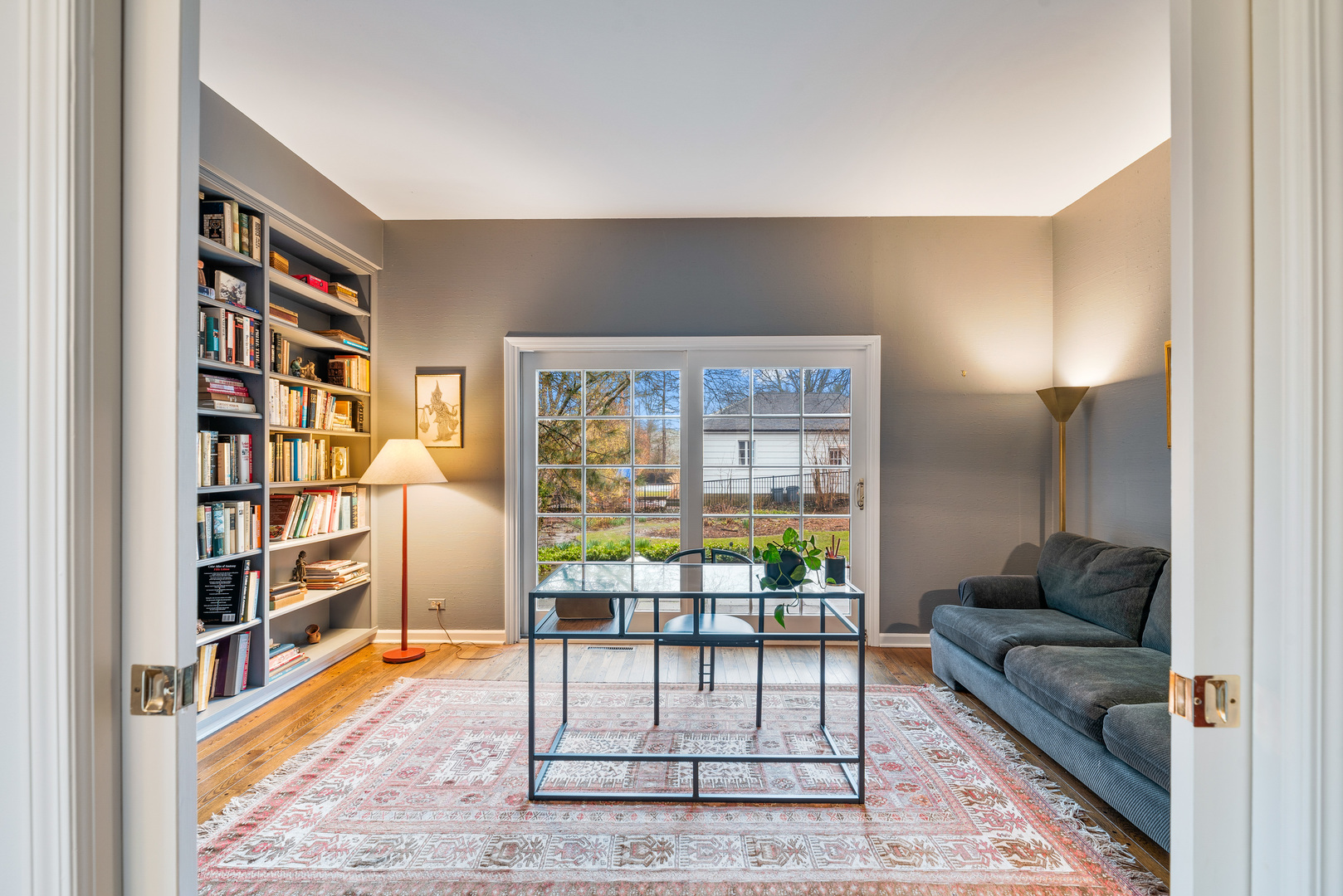 200 Hazel Avenue Glencoe, IL 60022 - Photo 16 of 51 a living room with furniture and a book shelf