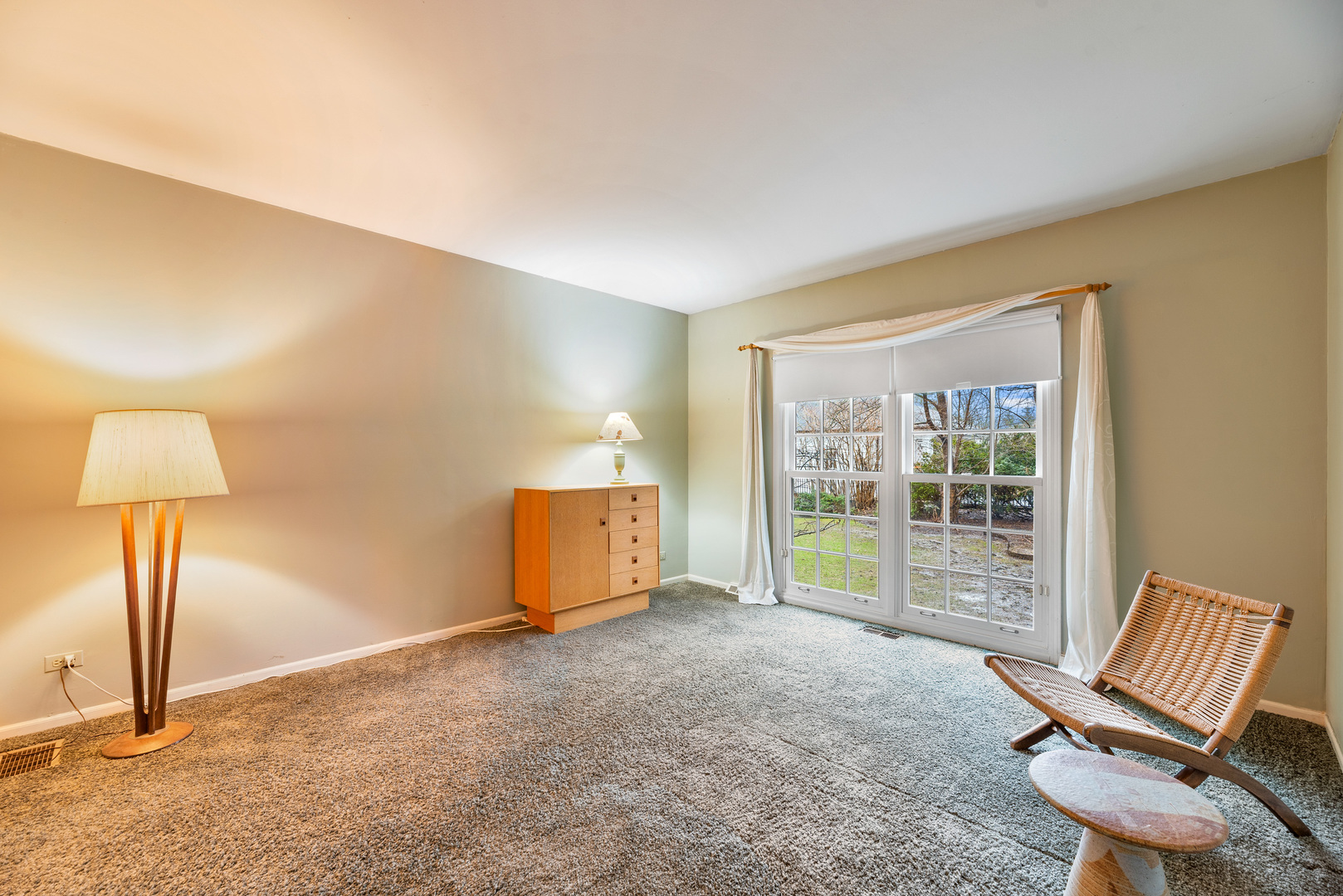 200 Hazel Avenue Glencoe, IL 60022 - Photo 17 of 51 a view of an empty room with furniture and a window