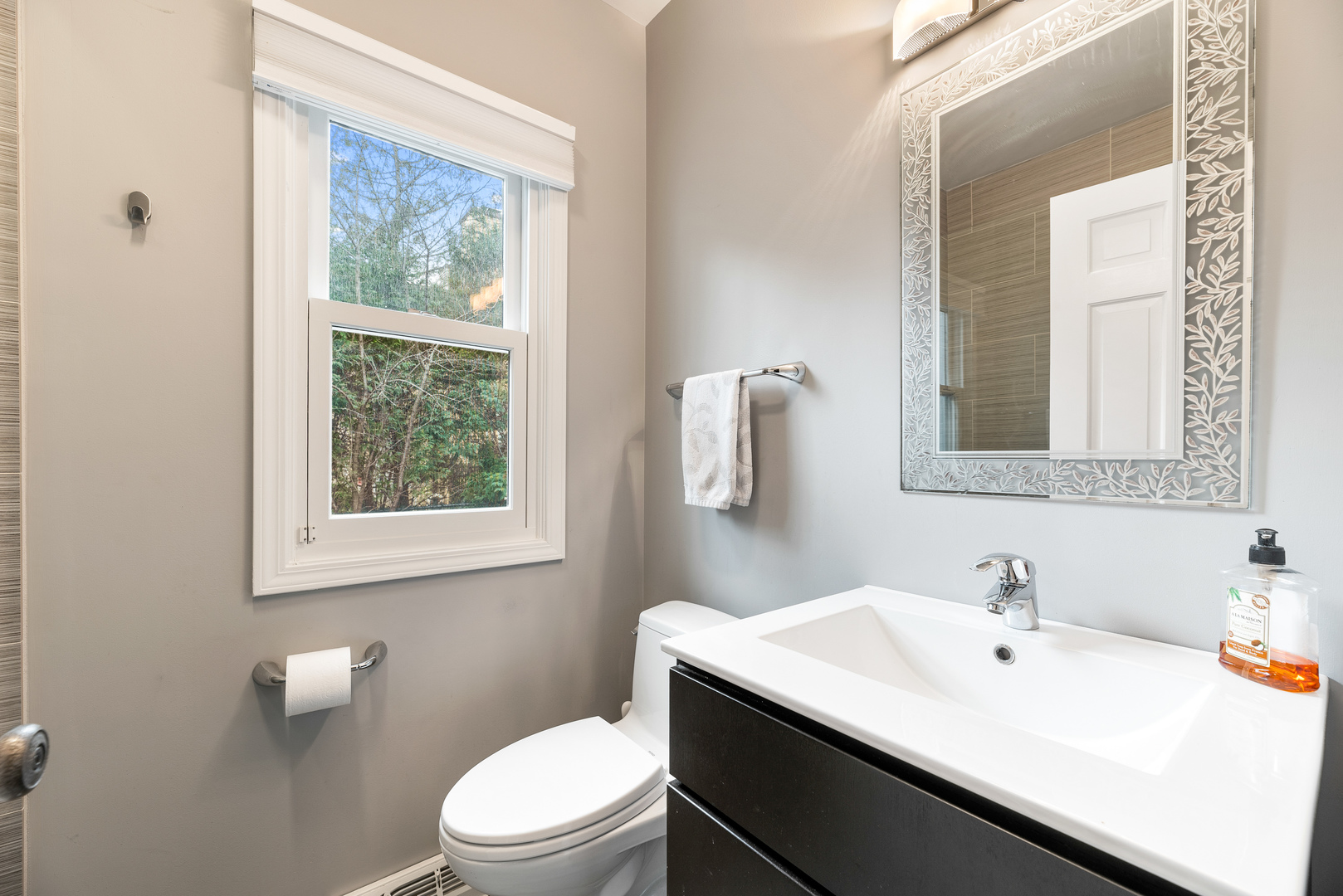 200 Hazel Avenue Glencoe, IL 60022 - Photo 18 of 51 a bathroom with a sink and a toilet