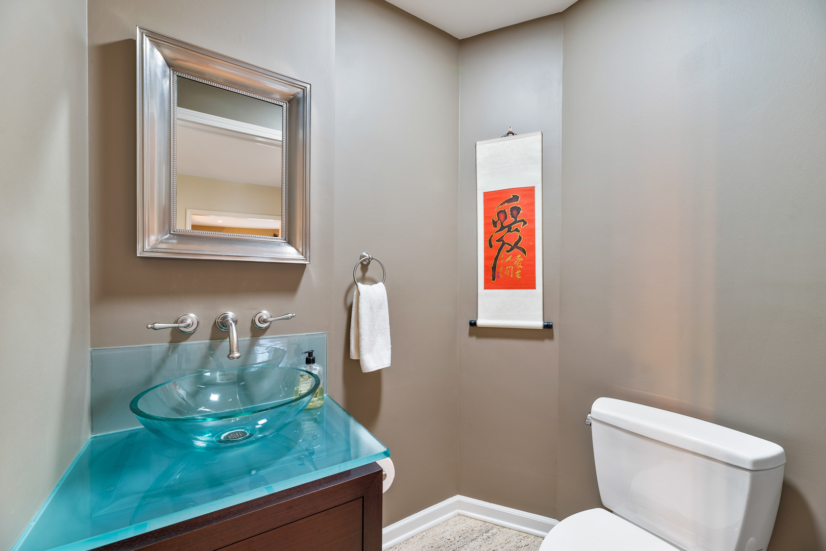 200 Hazel Avenue Glencoe, IL 60022 - Photo 20 of 51 a bathroom with a toilet sink and mirror