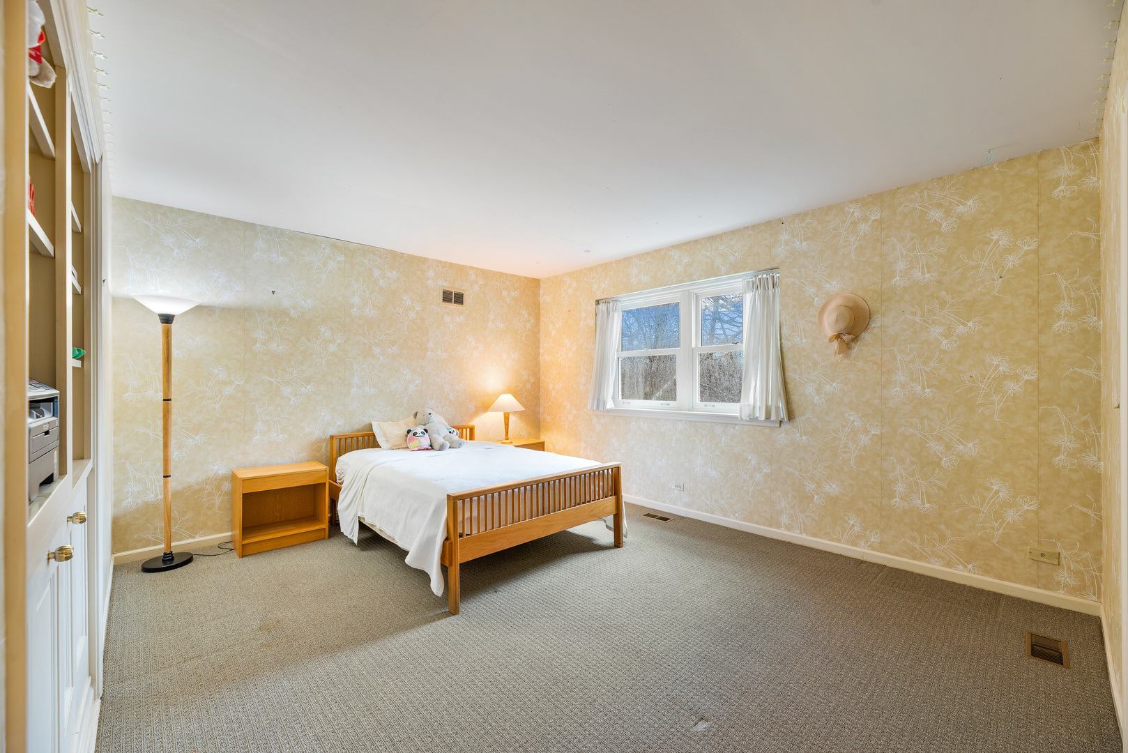 200 Hazel Avenue Glencoe, IL 60022 - Photo 27 of 51 a bed room with a bed and a window