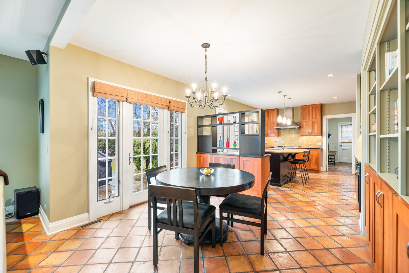 200 Hazel Avenue Glencoe, IL 60022 - Photo 9 of 51 a dining room with furniture a chandelier and wooden floor
