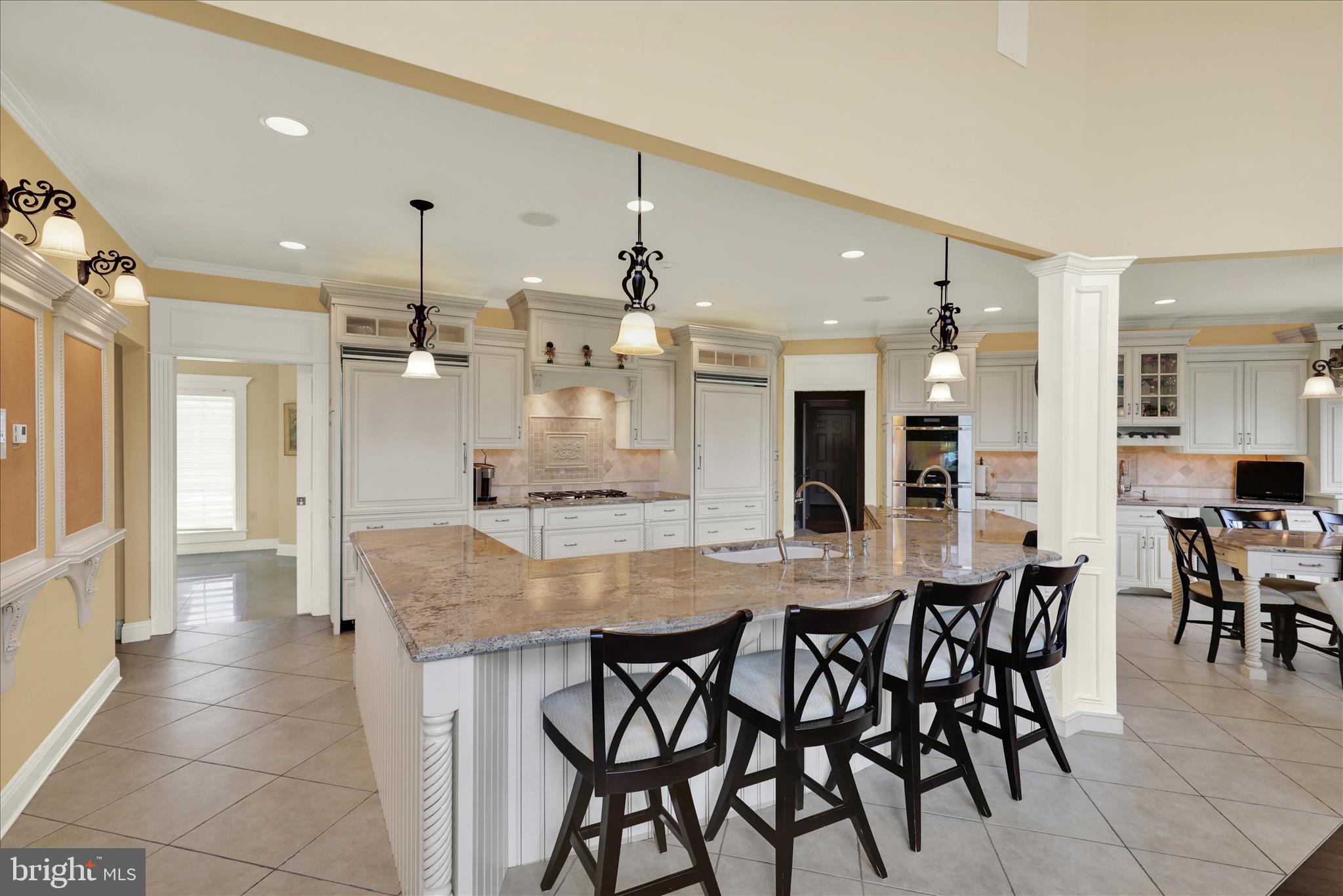 1000 Bluestone Drive Lititz, PA 17543 - Photo 113 of 132 a dining hall with stainless steel appliances kitchen island granite countertop a table chairs and a sink