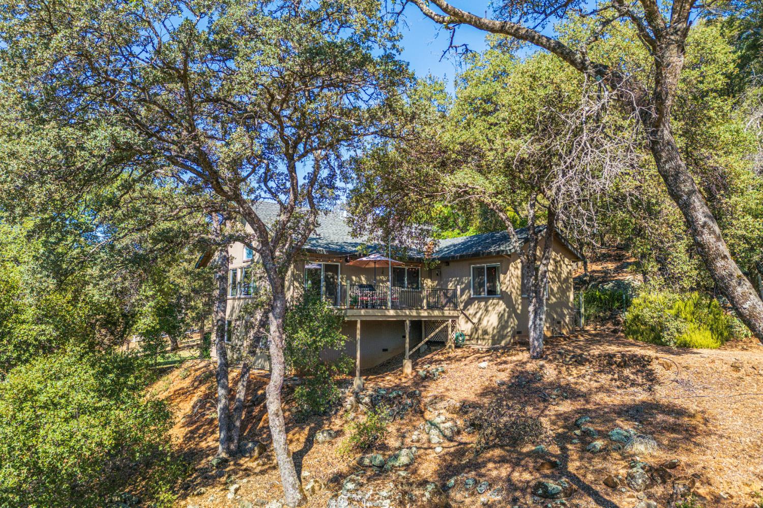 9290 Cramer Road Auburn, CA 95602 - Photo 4 of 67 a view of a house with a yard