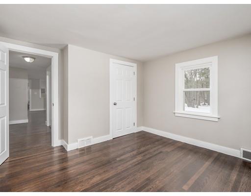 57 Larkin Road Newbury, MA 01922 - Photo 16 of 26 a view of an empty room with wooden floor and a window