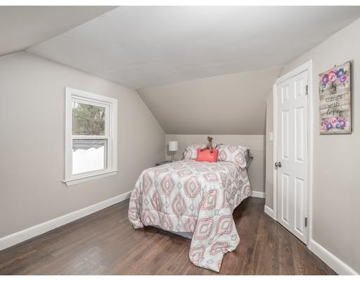 57 Larkin Road Newbury, MA 01922 - Photo 20 of 26 a bedroom with a bed and a window