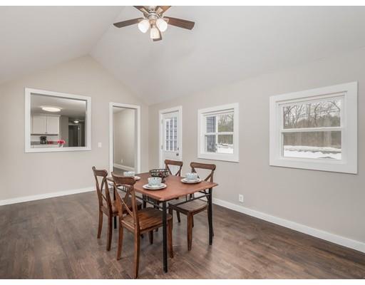 57 Larkin Road Newbury, MA 01922 - Photo 4 of 26 a view of a dining room with furniture and chandelier