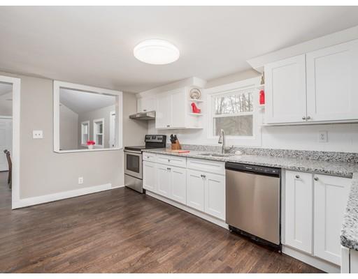 57 Larkin Road Newbury, MA 01922 - Photo 7 of 26 a kitchen with granite countertop a sink and cabinets