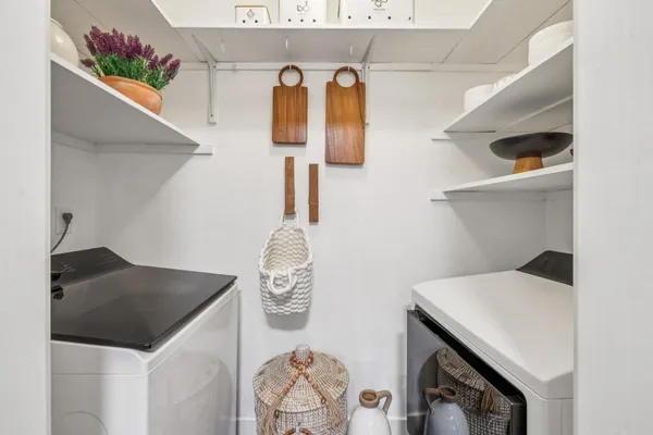 a kitchen with a sink and a stove