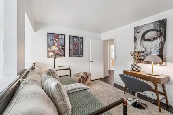 a view of a car park in front of a building