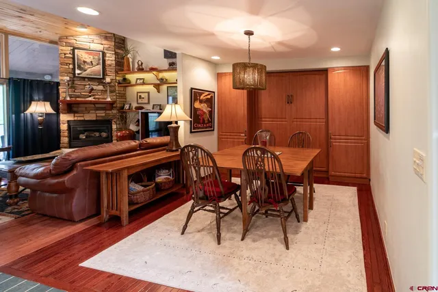 a view of a dining room with furniture