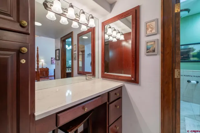 a room with furniture and chandelier