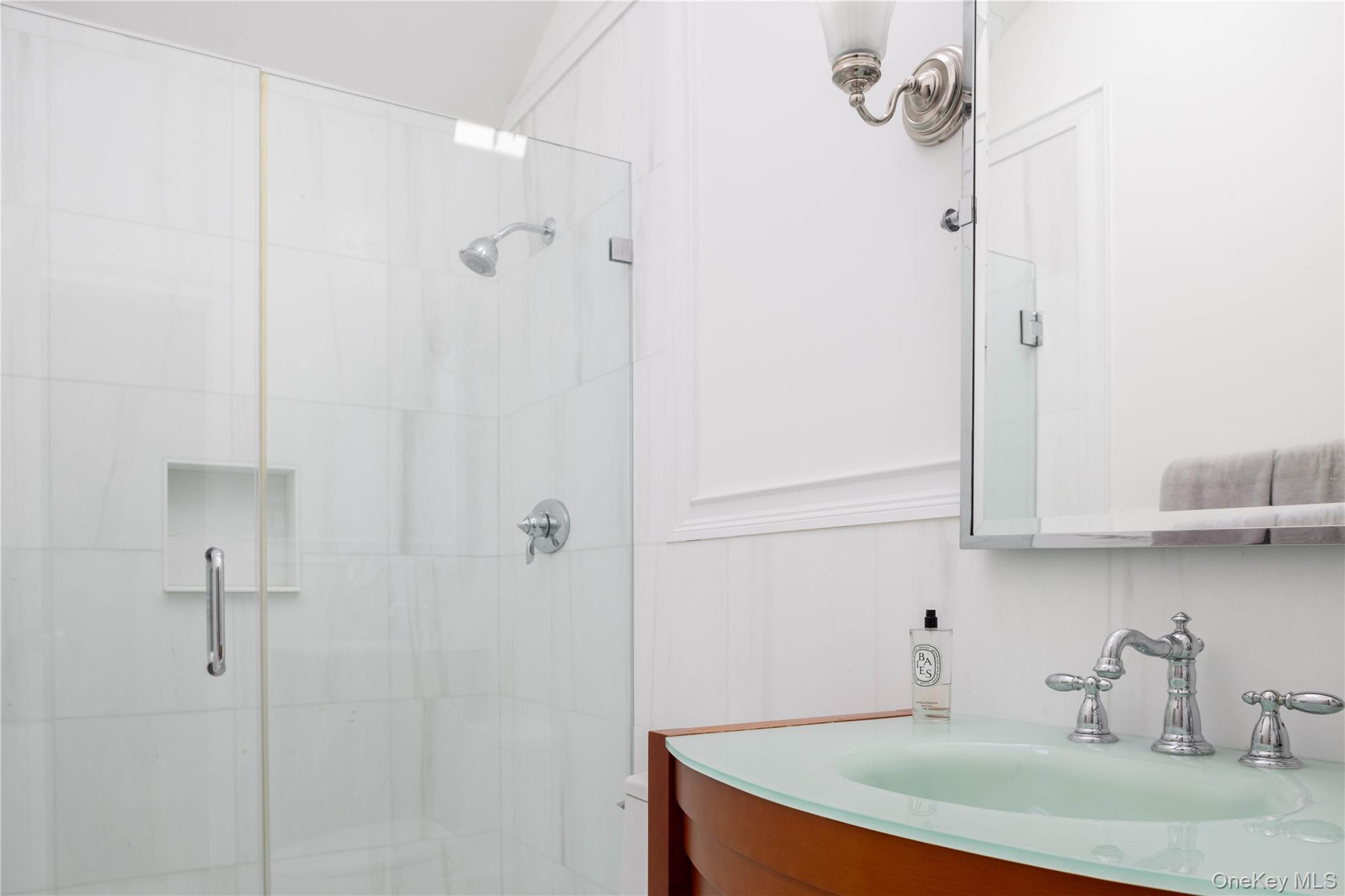 3 Clay Pit Road Remsenburg, NY 11960 - Photo 11 of 20 a bathroom with a sink and vanity